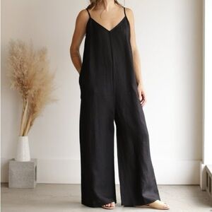 Ali Golden black V-neck spaghetti strap jumpsuit romper